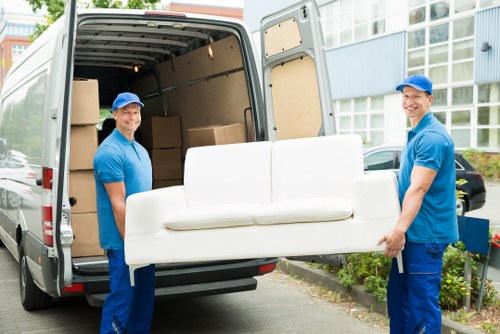 Man and van team loading reusable items for sustainable recycling in Brent