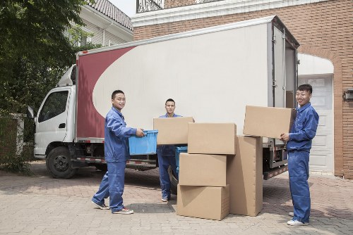 Moving van loading boxes outside a Brent residential property