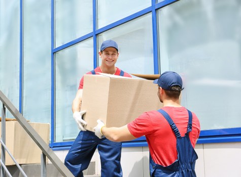 Furniture moving process with careful handling in a Brent property