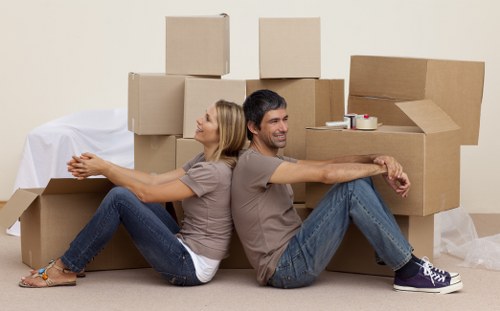 Household boxes and furniture prepared for a removal service in Brent