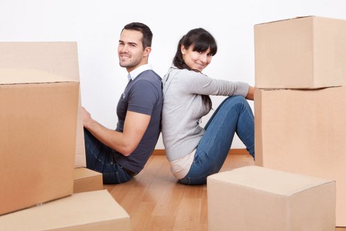 Loading furniture into a van for a Brent property move